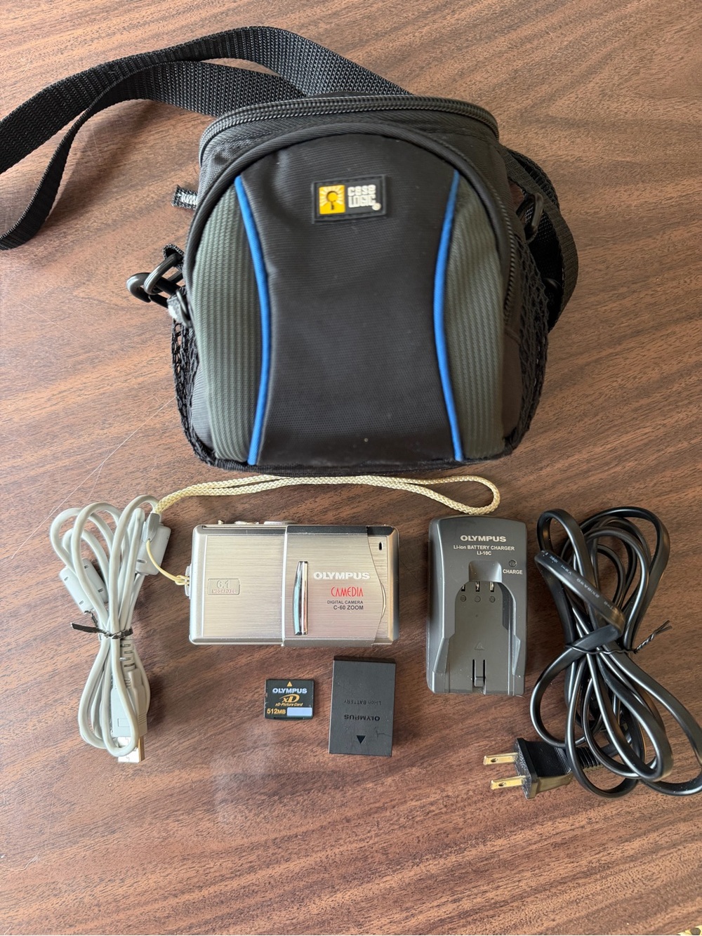 Olympus Silver Compact Digital Camera Carry Case and Accessories Bundle